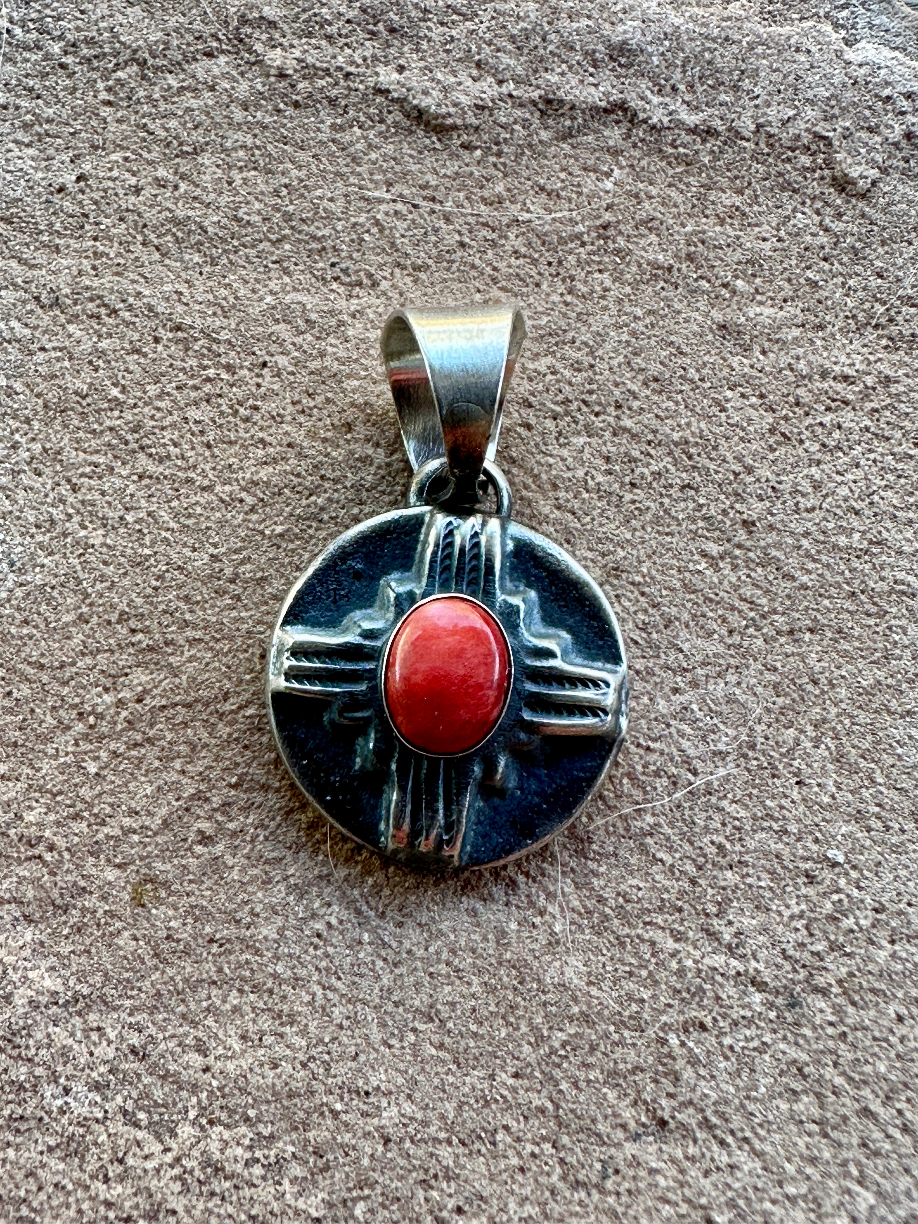 Navajo Sterling Silver Orange Spiny Round Zia Pendant By Chimney Butte