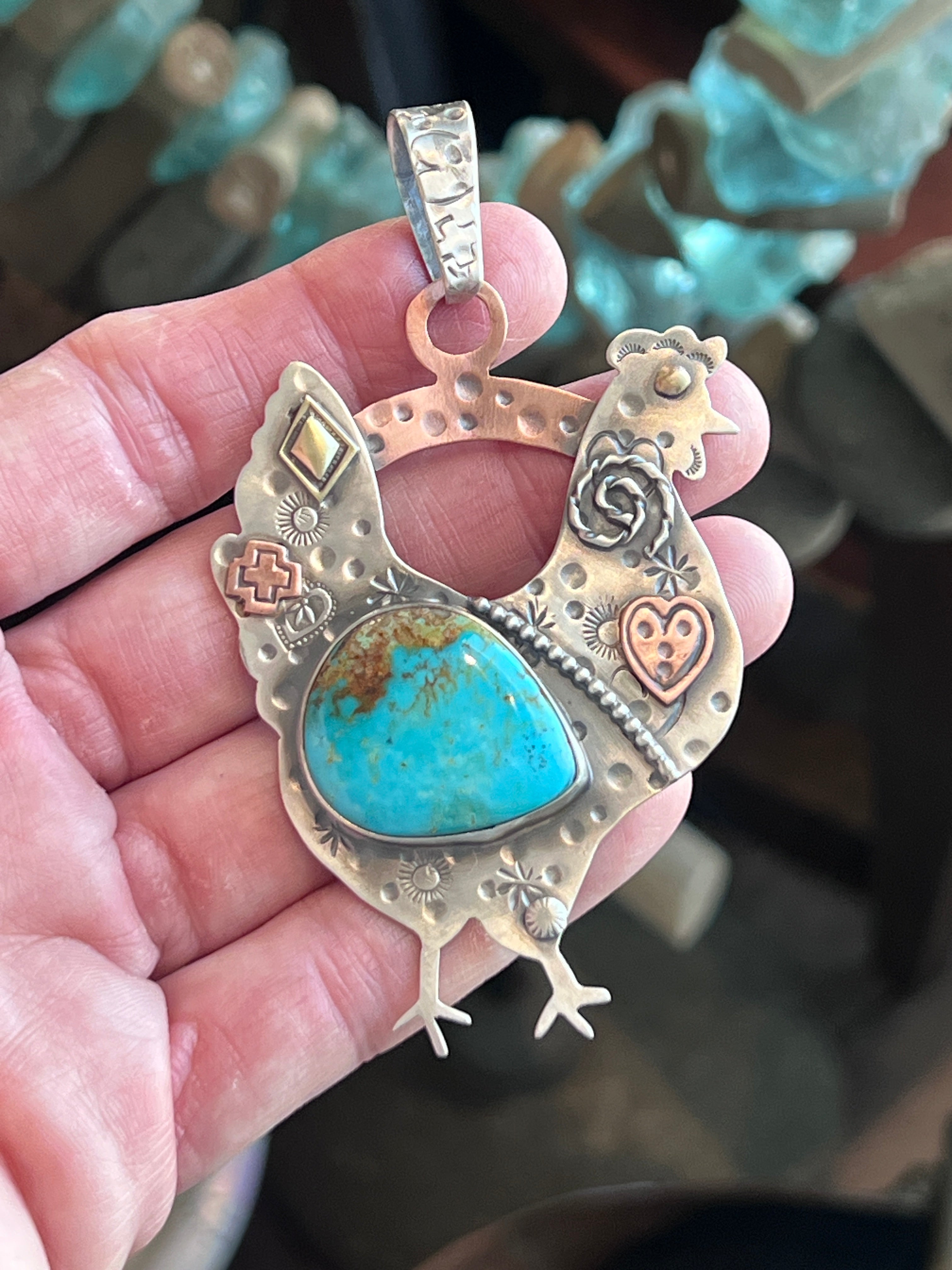 The Nizhoni Cluckers: Hand Stamped and Layered Sterling Silver, Brass, Copper & Kingman Turquoise Chicken Pendants by Kimari Somers