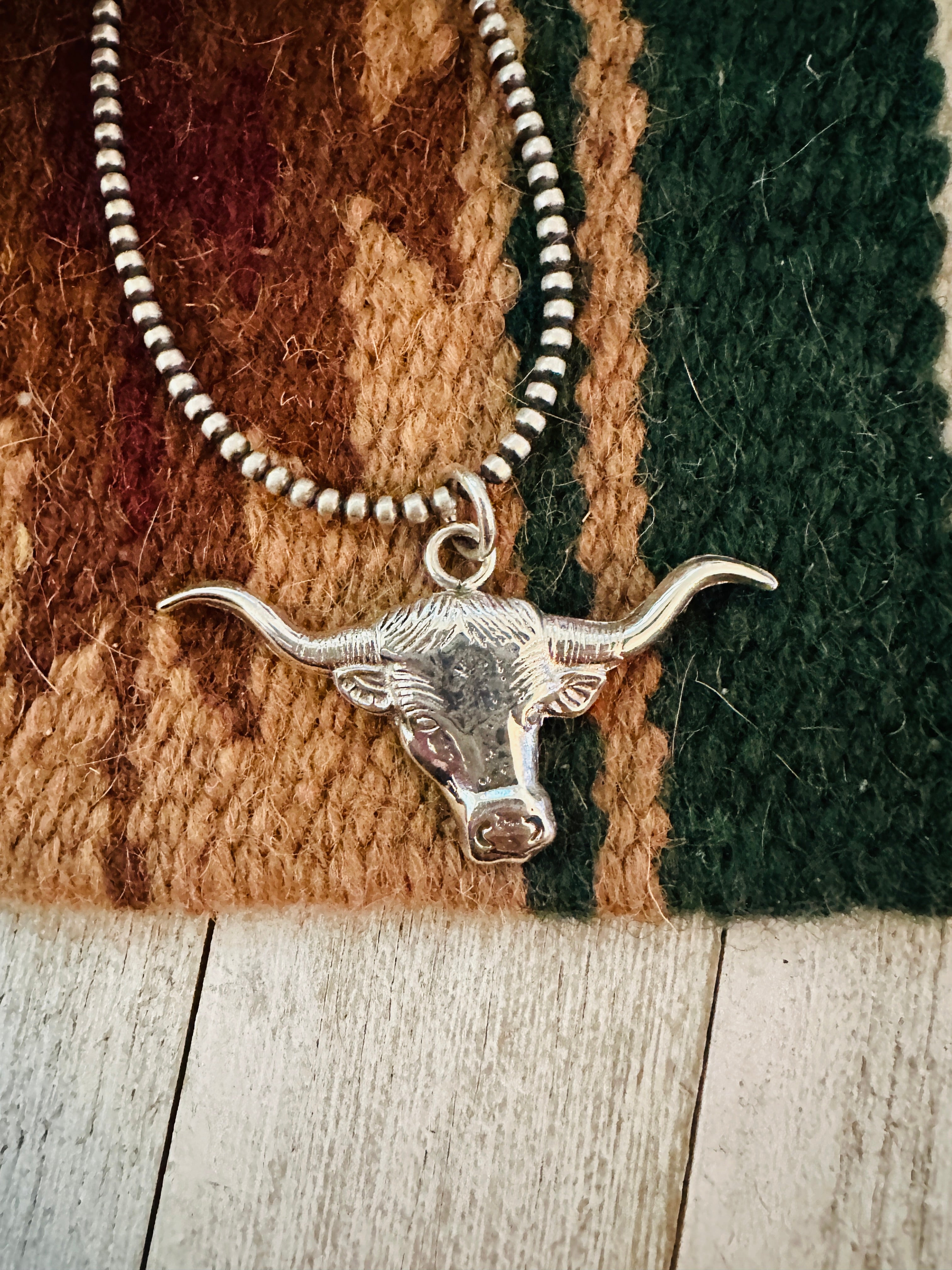 Navajo Sterling Silver Bullhead Pendant