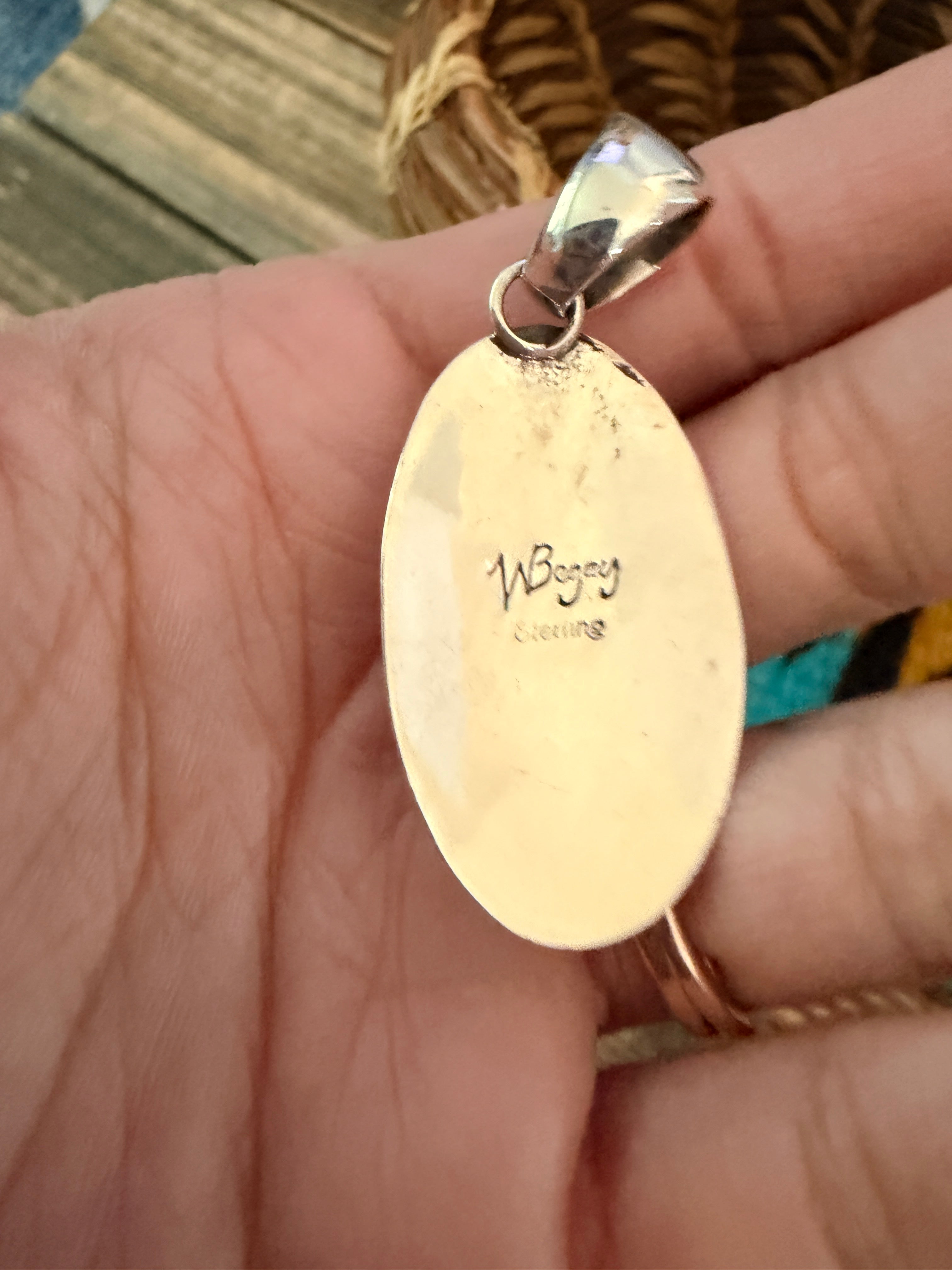 Handcrafted Sterling Silver and Turquoise Pendant by Wilford Begay