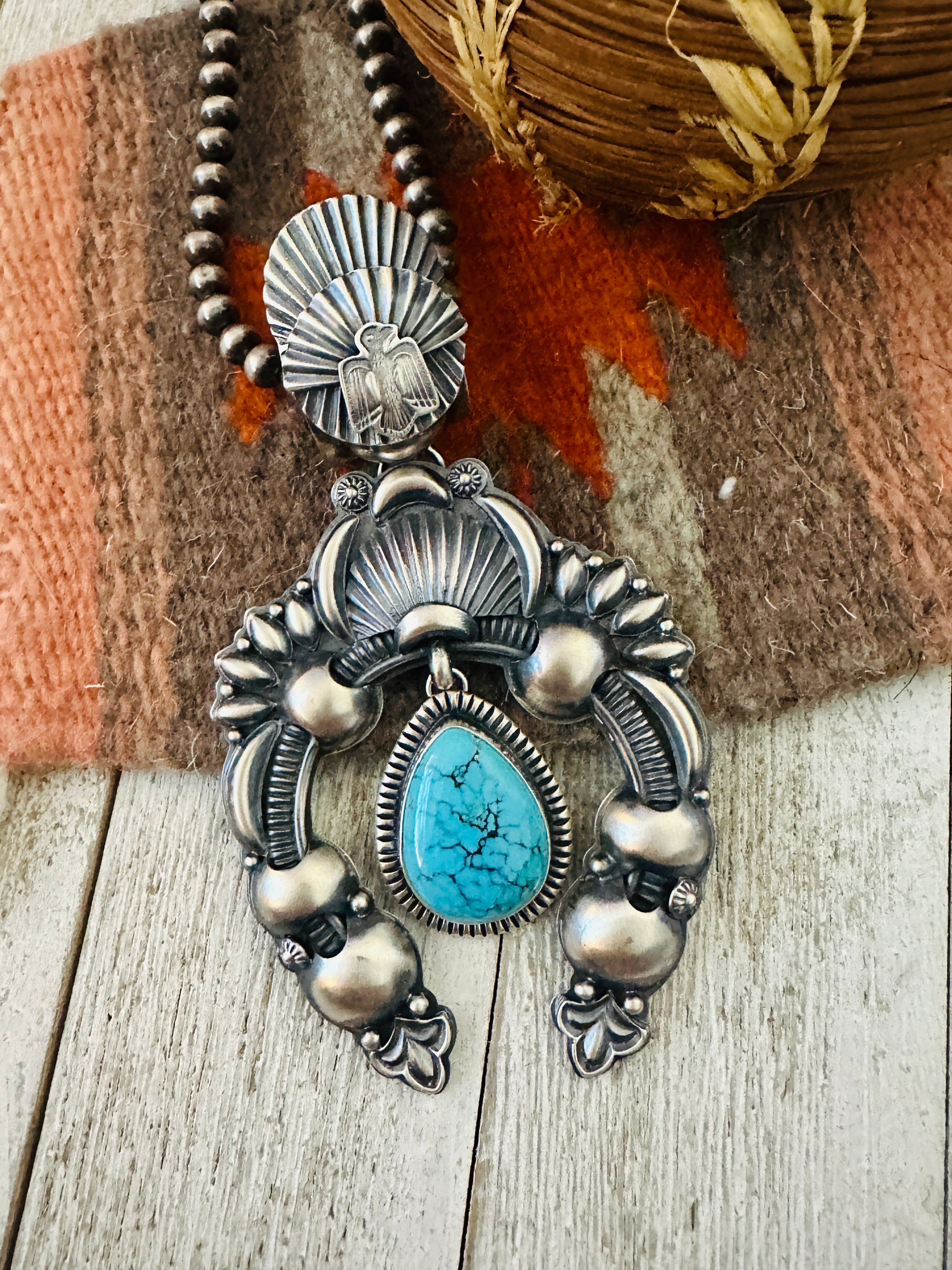 Handcrafted Sterling Silver & Turquoise Naja Pendant by Delbert Gordon