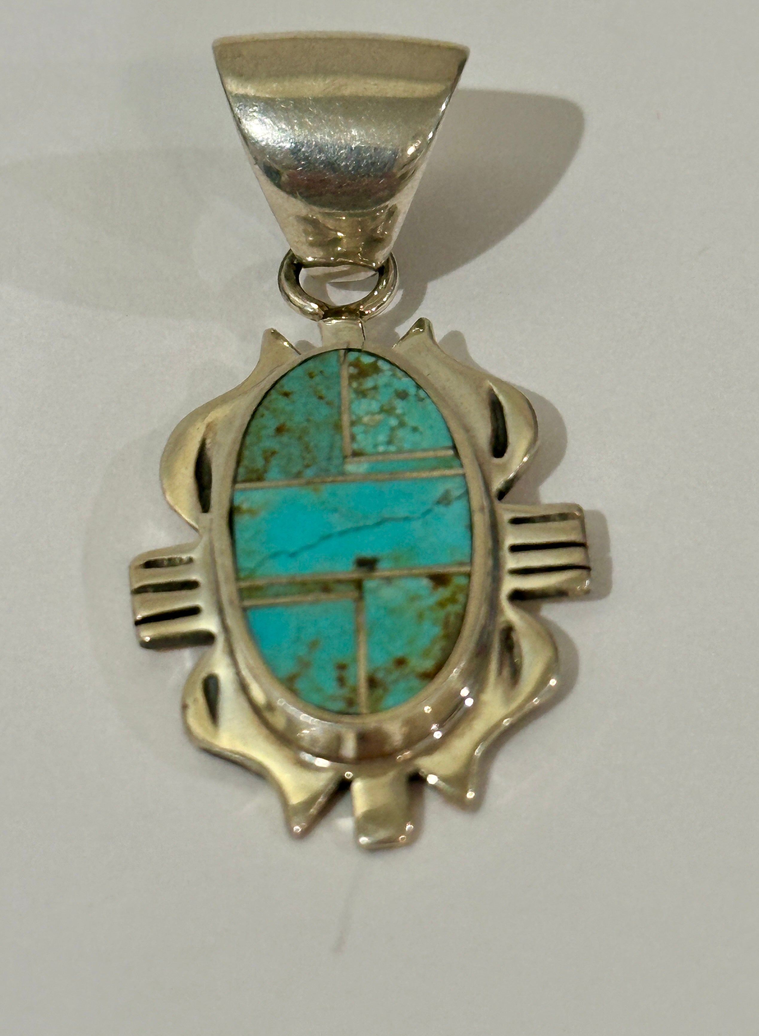 Navajo Turquoise 8 & Sterling Silver Jagged Oval Pendant