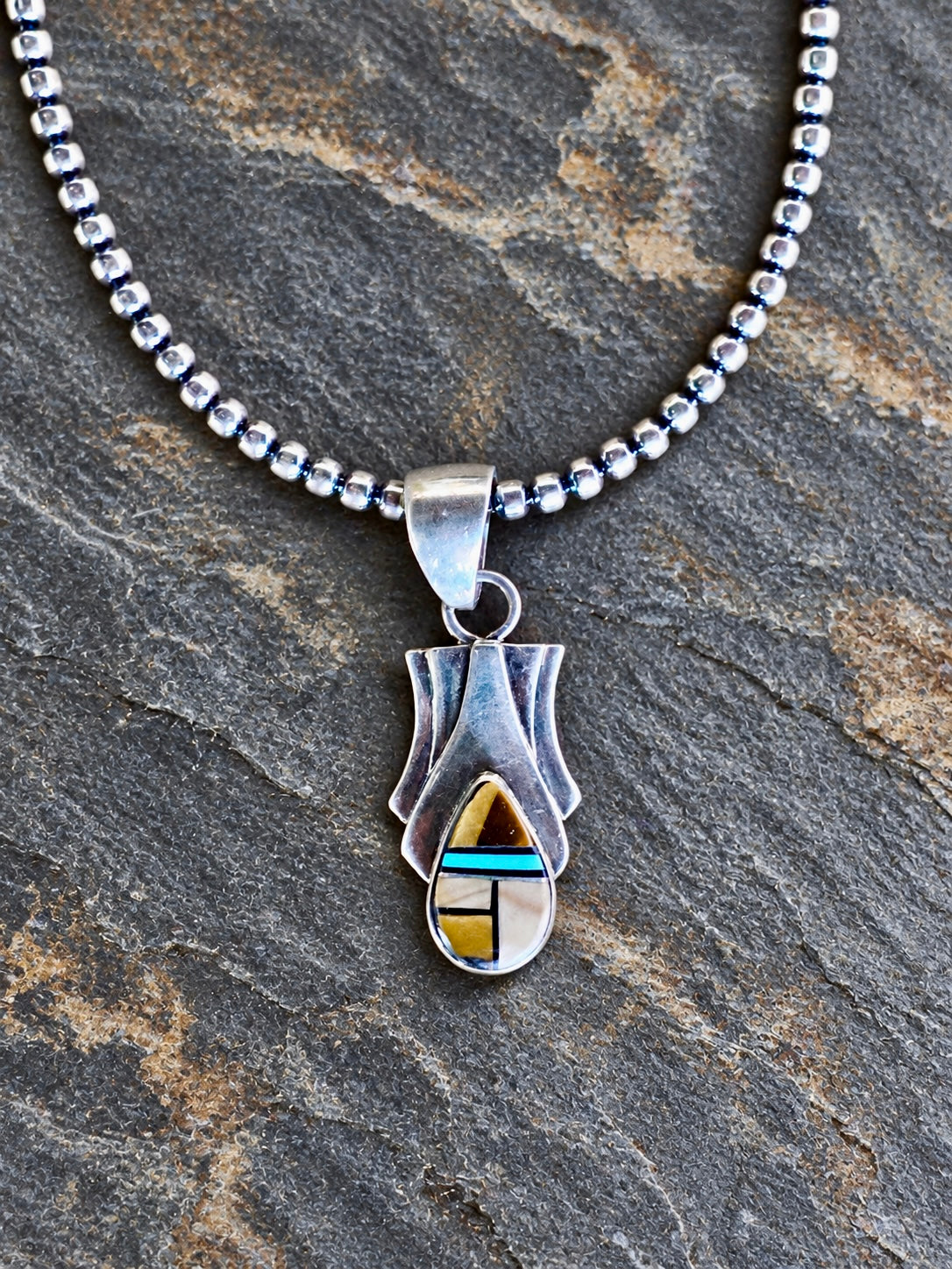 Handcrafted Multi Stone Turquoise, Onyx, Petrified Wood Pendant