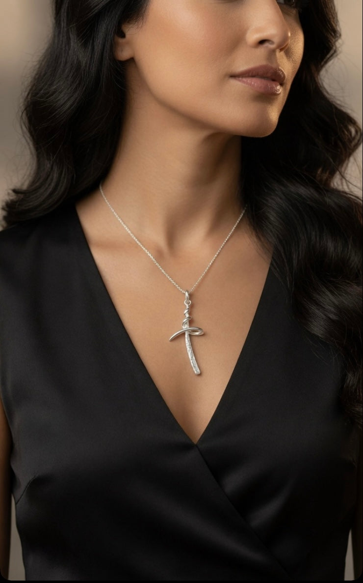 Sterling Silver Textured Cross Necklace With Swirl