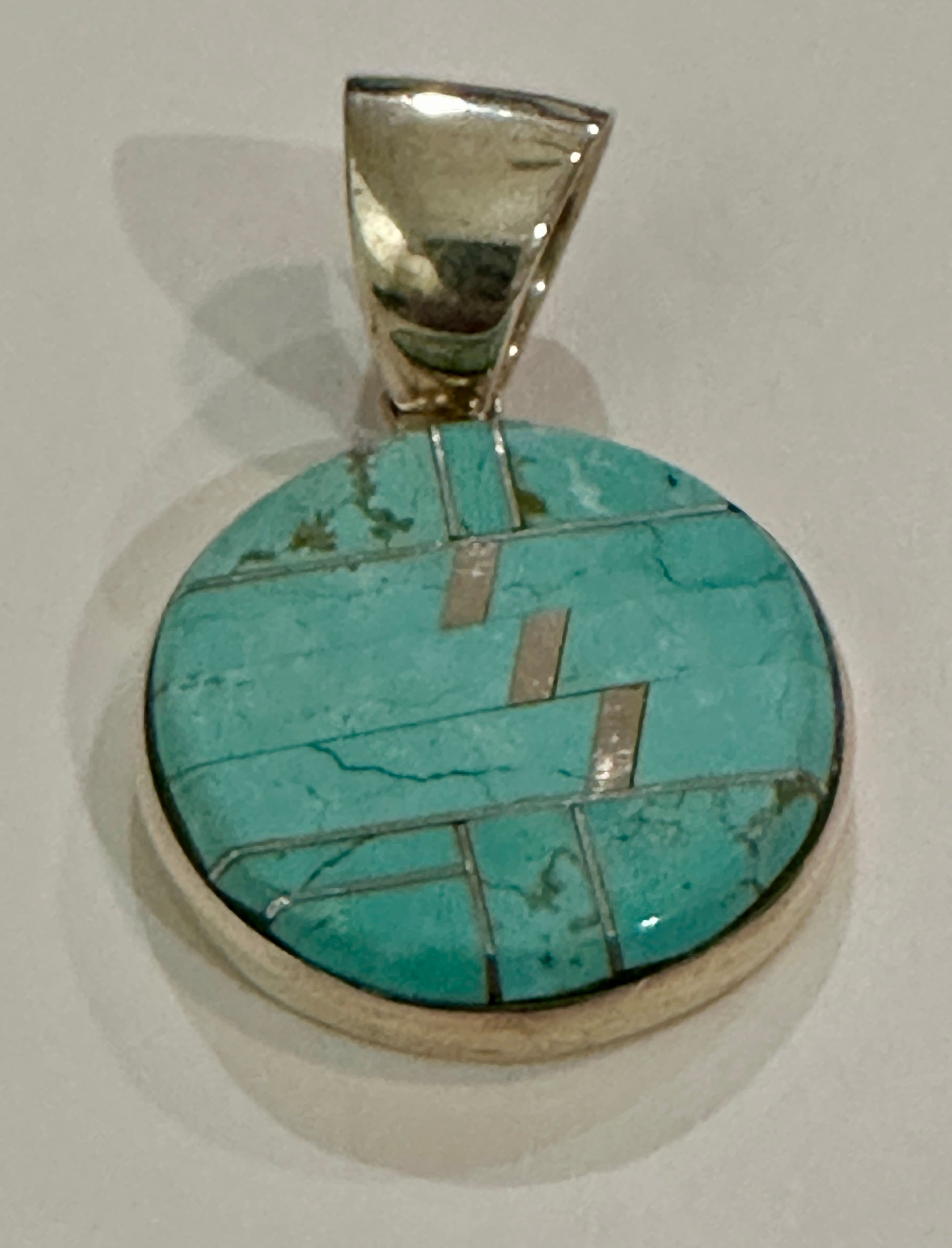 Navajo Turquoise 8 & Sterling Silver Circle Pendanta