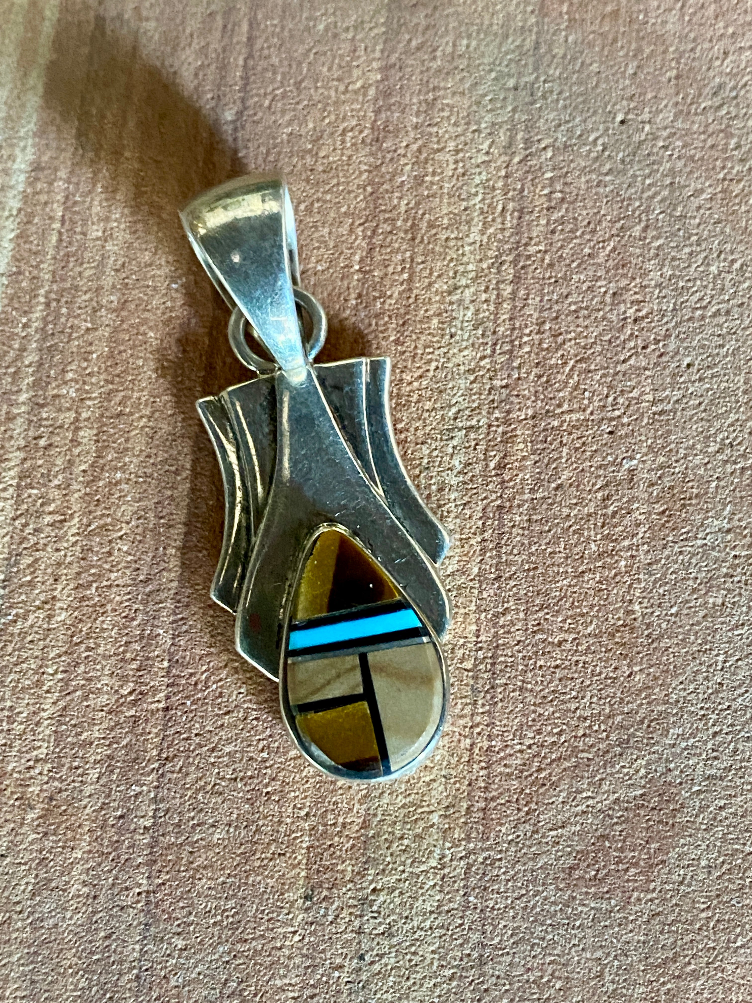 Navajo Turquoise, Onyx, Petrified Wood Pendant