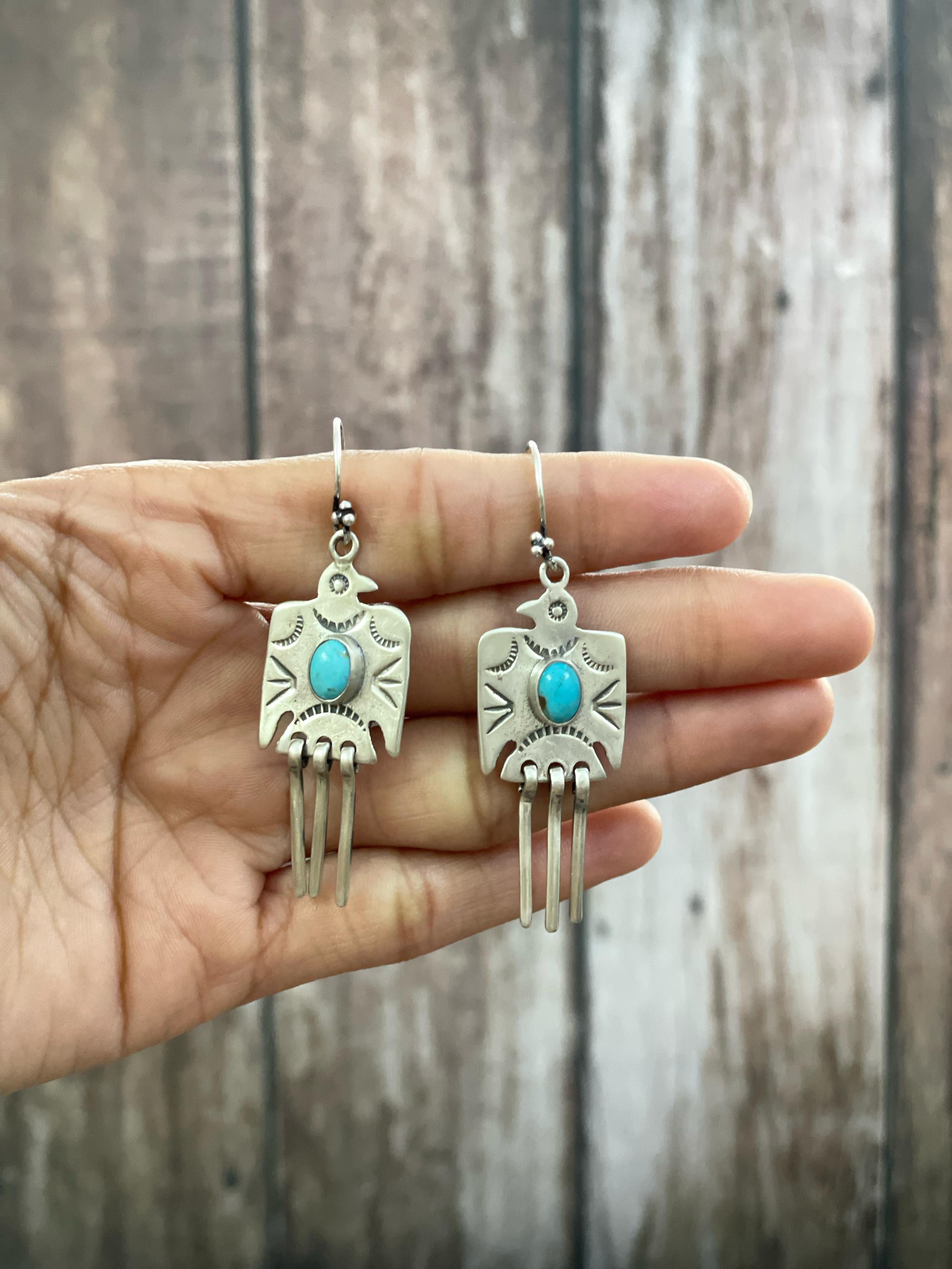 Handmade Sterling Silver White Buffalo, Kingman, Paloma Turquoise Dangle Thunder Bird Earrings with Signed Nizhoni