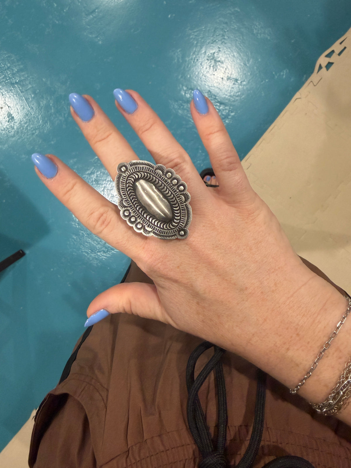 Handcrafted Sterling Silver Adjustable Concho Ring by Leander Tahe