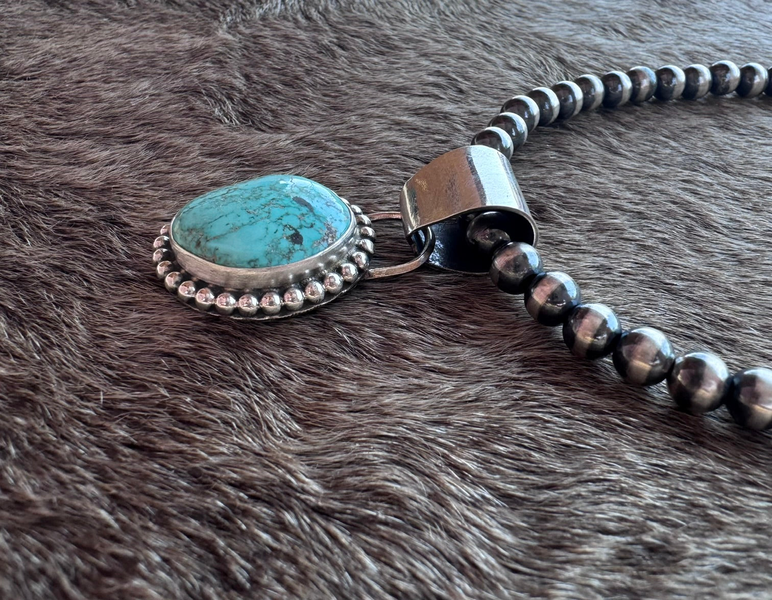 Handmade Sterling Silver Carico Lake Turquoise Stamped Ball Pendant by Roaming Buffalo
