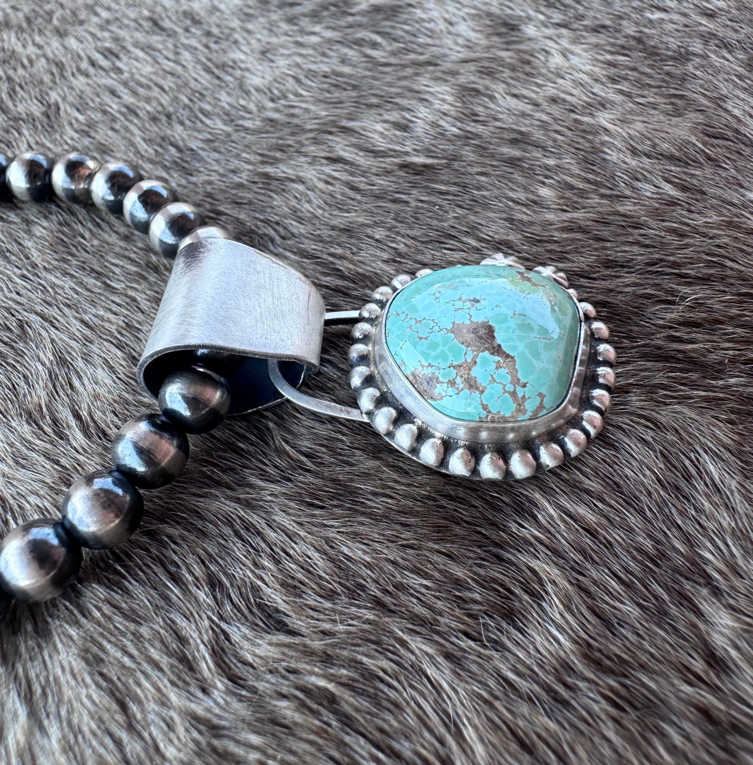 Handmade Sterling Silver Carico Lake Turquoise Ball Pendant by Roaming Buffalo