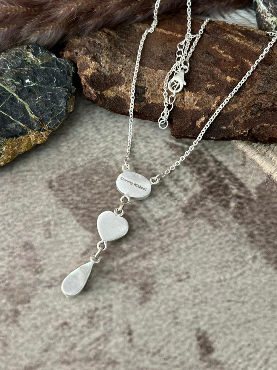 Handmade Sterling Silver Manassa Turquoise Collection: Drop Heart Necklace "Signed Nizhoni"