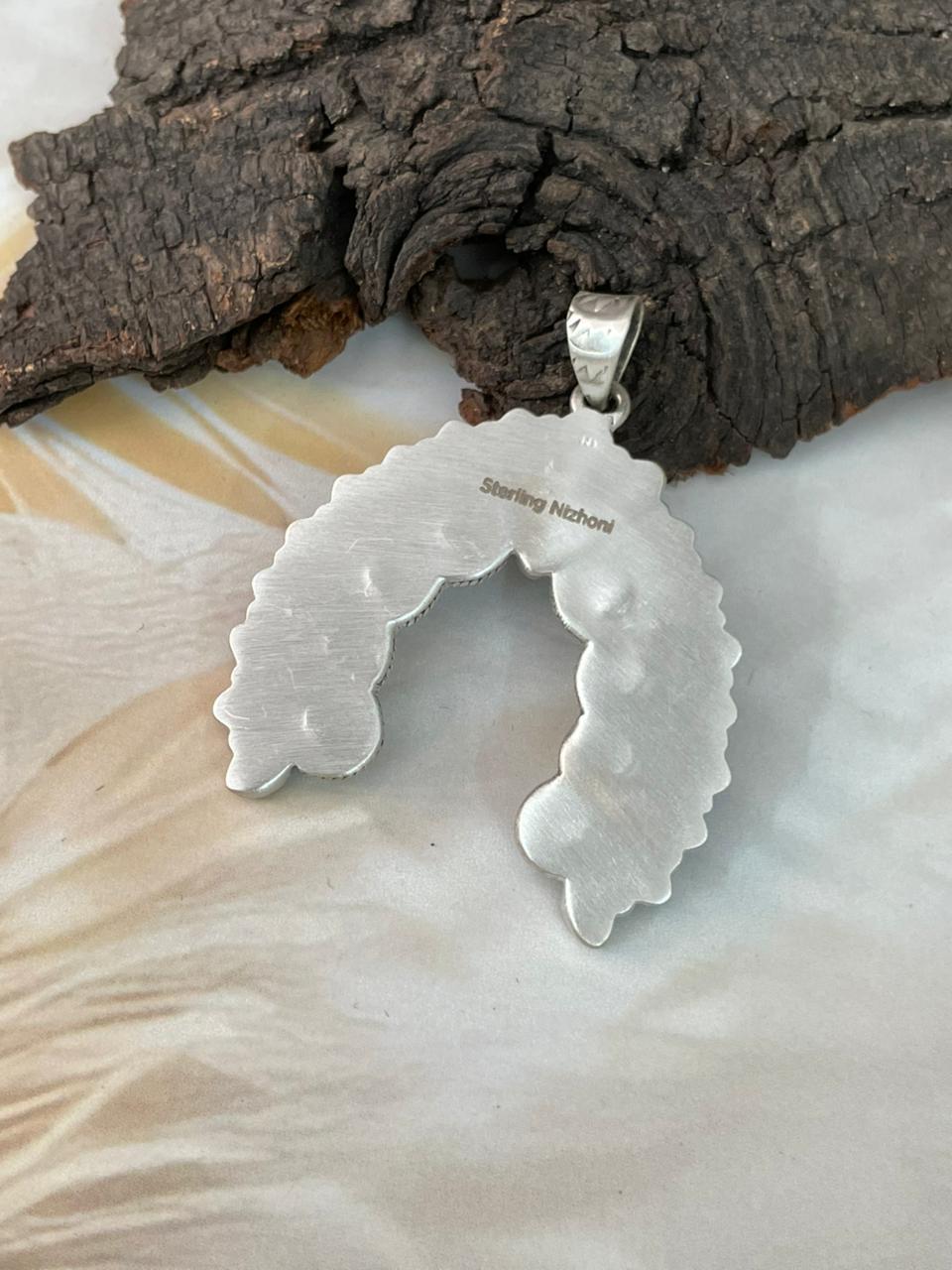 Handmade Sterling Silver White Buffalo Naja Pendant "Signed Nizhoni"