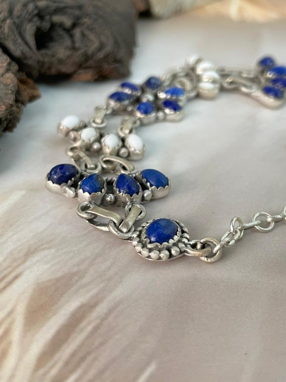 Handmade Sterling Silver White Buffalo with Lapis Bracelet "Signed Nizhoni" (1)