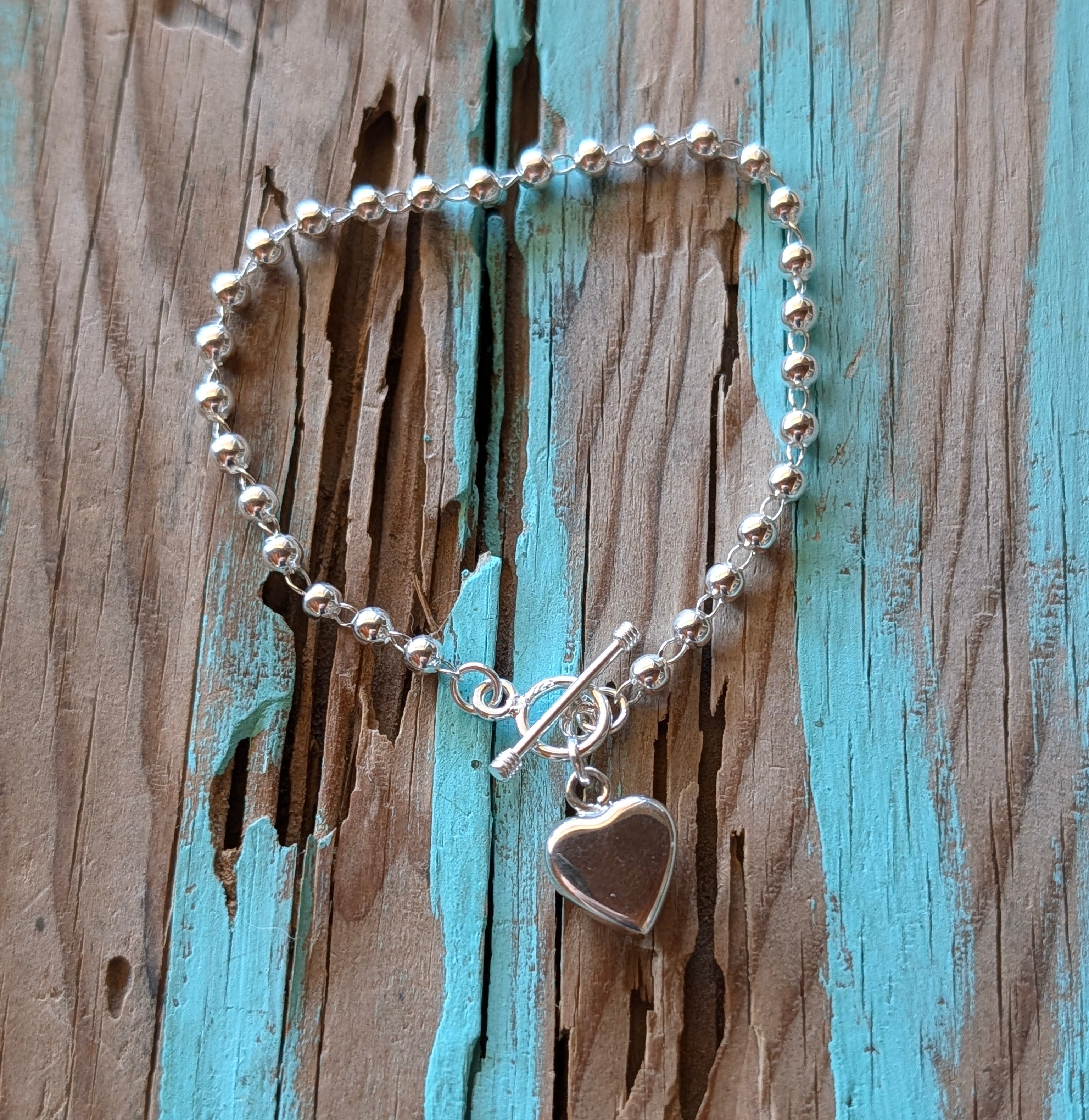 Sterling Silver Beaded Chain Bracelet With Dangling Heart