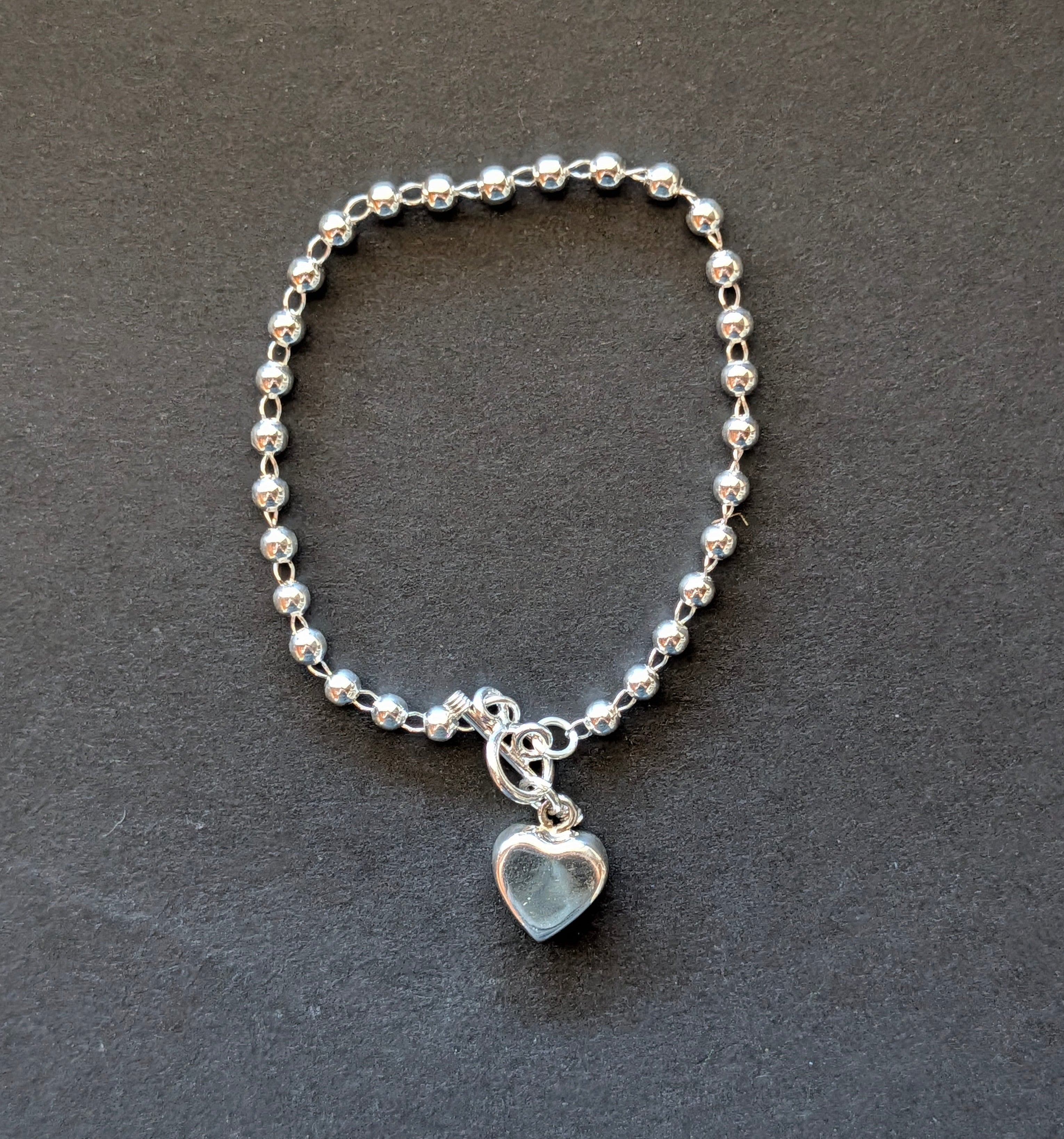 Sterling Silver Beaded Chain Bracelet With Dangling Heart