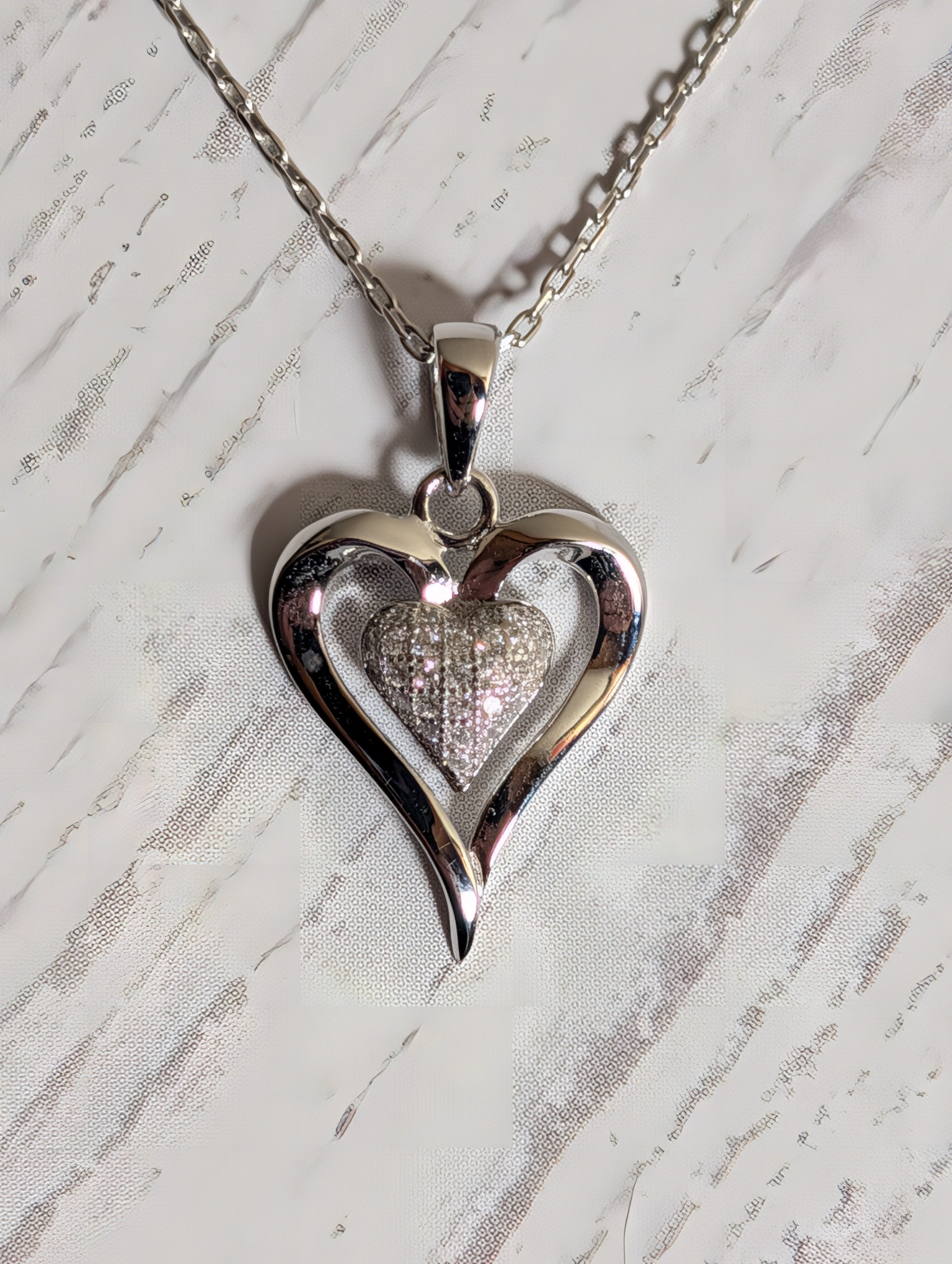 Heart Shaped CZ Outlined Pendant On Sterling Silver Necklace