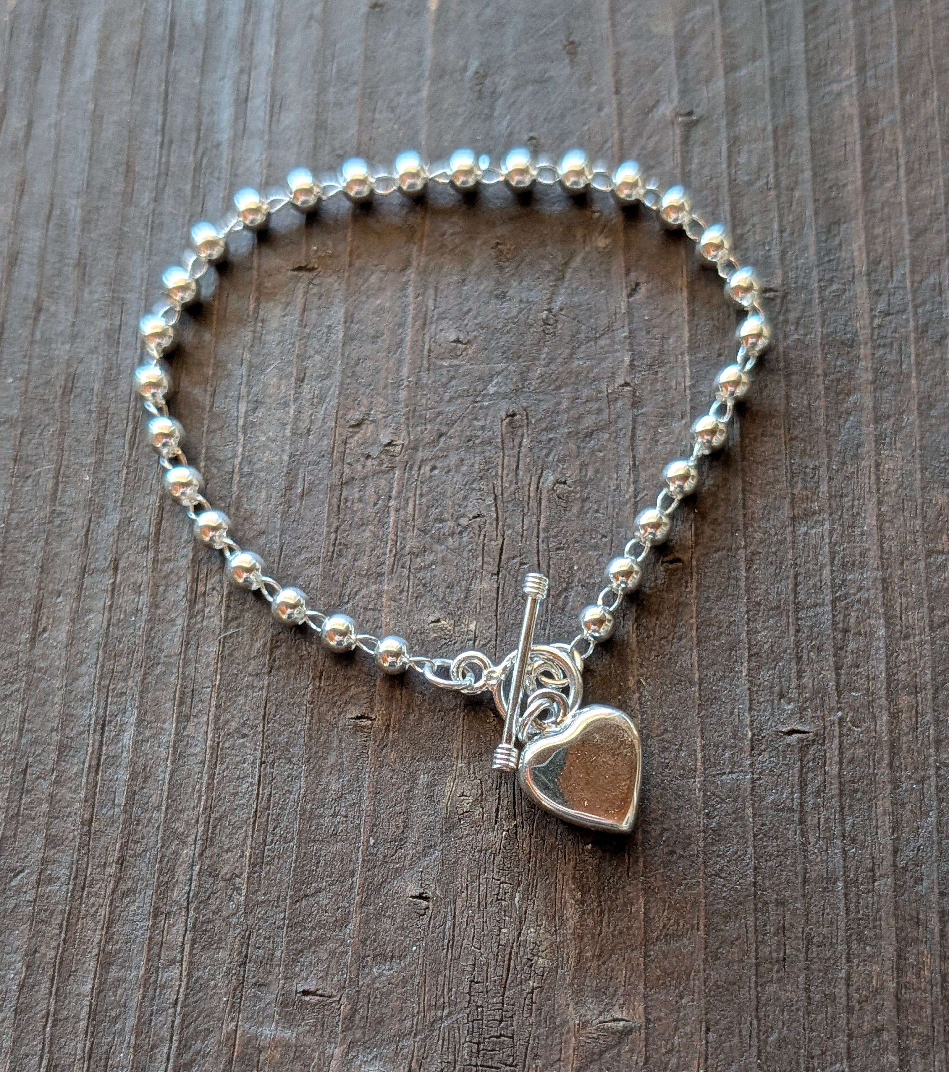 Sterling Silver Beaded Chain Bracelet With Dangling Heart