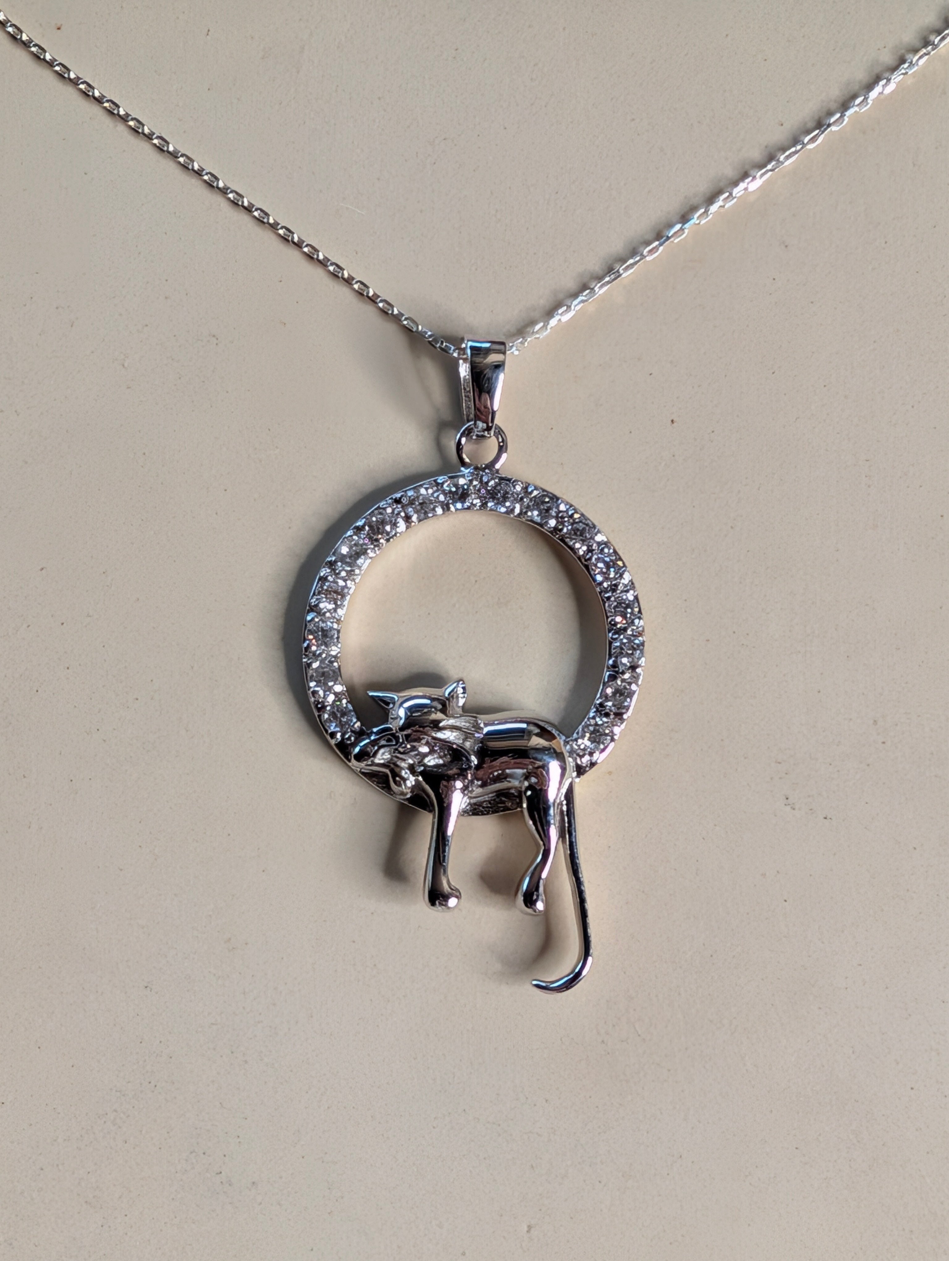 Sterling Silver Cat Perched On CZ Studded Circle Pendant Necklace