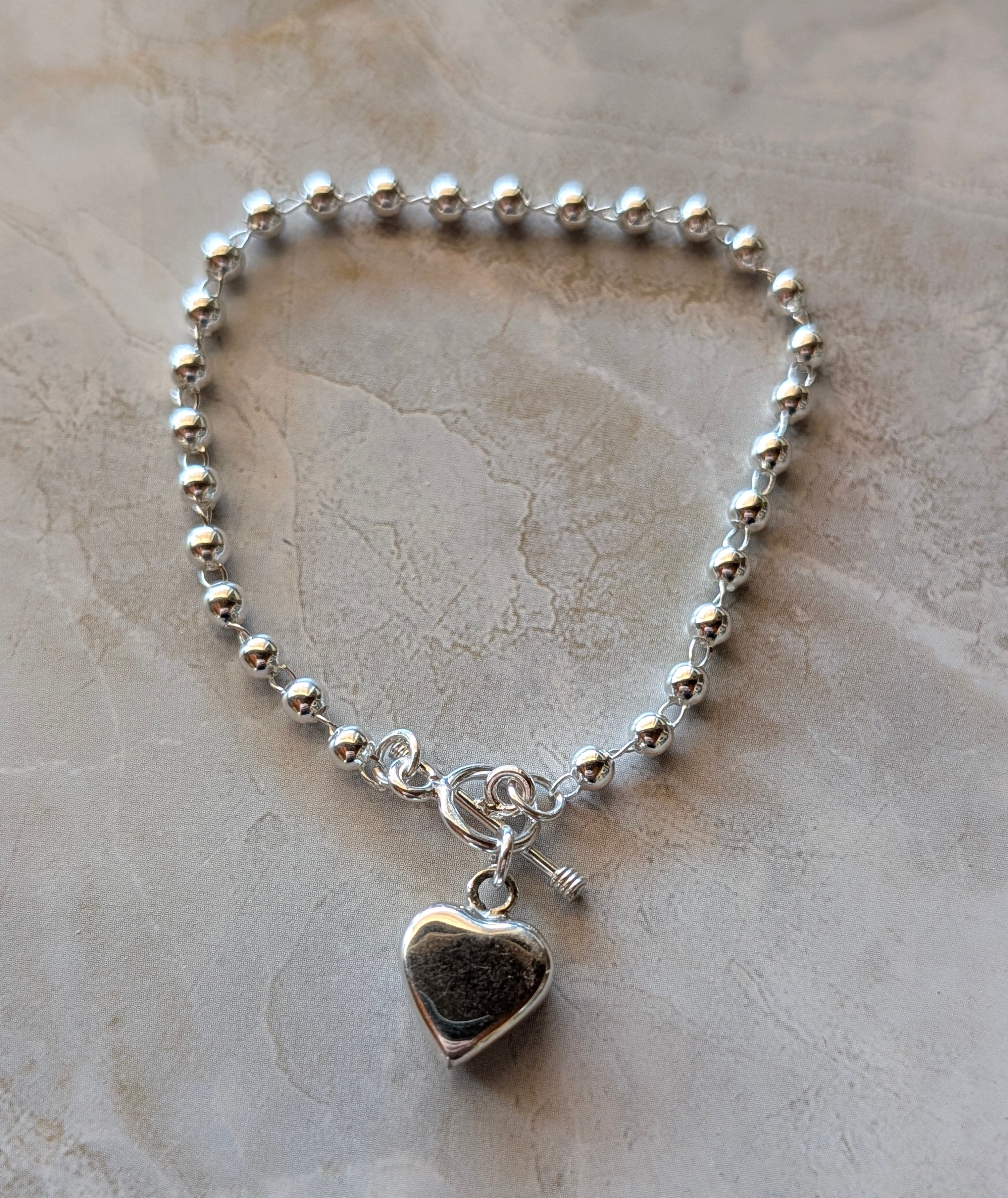 Sterling Silver Beaded Chain Bracelet With Dangling Heart