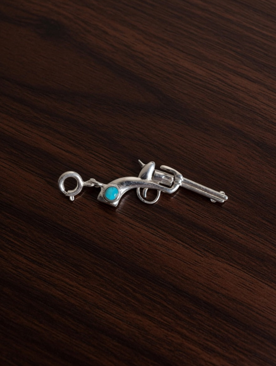 Sterling Silver Gun Charm With Turquoise
