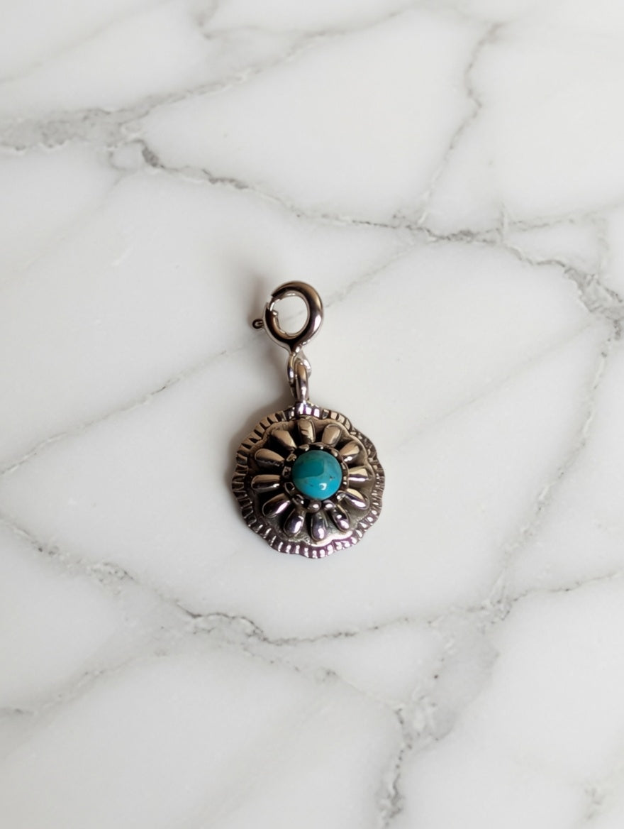 Sterling Silver Southwestern Style Rounded Sunburst Flower Charm With Turquoise