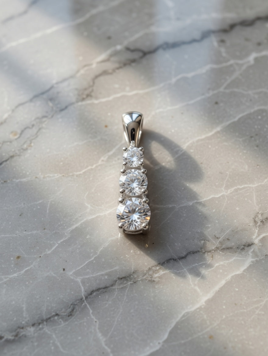 Sterling Silver CZ Three Stone Vertical Pendant