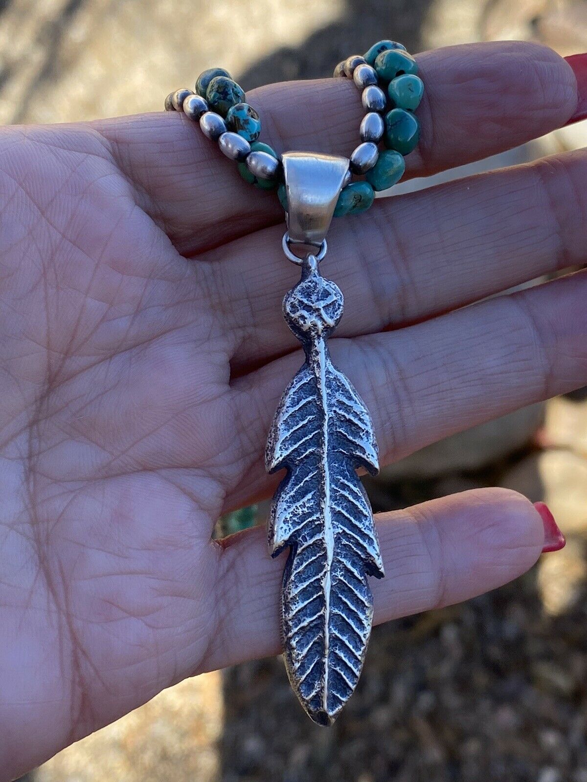 Navajo Sterling Silver Tufa Cast Feather