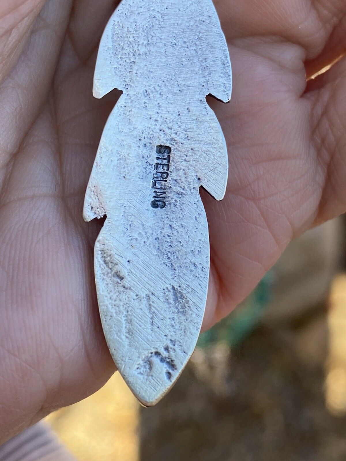 Navajo Sterling Silver Tufa Cast Feather