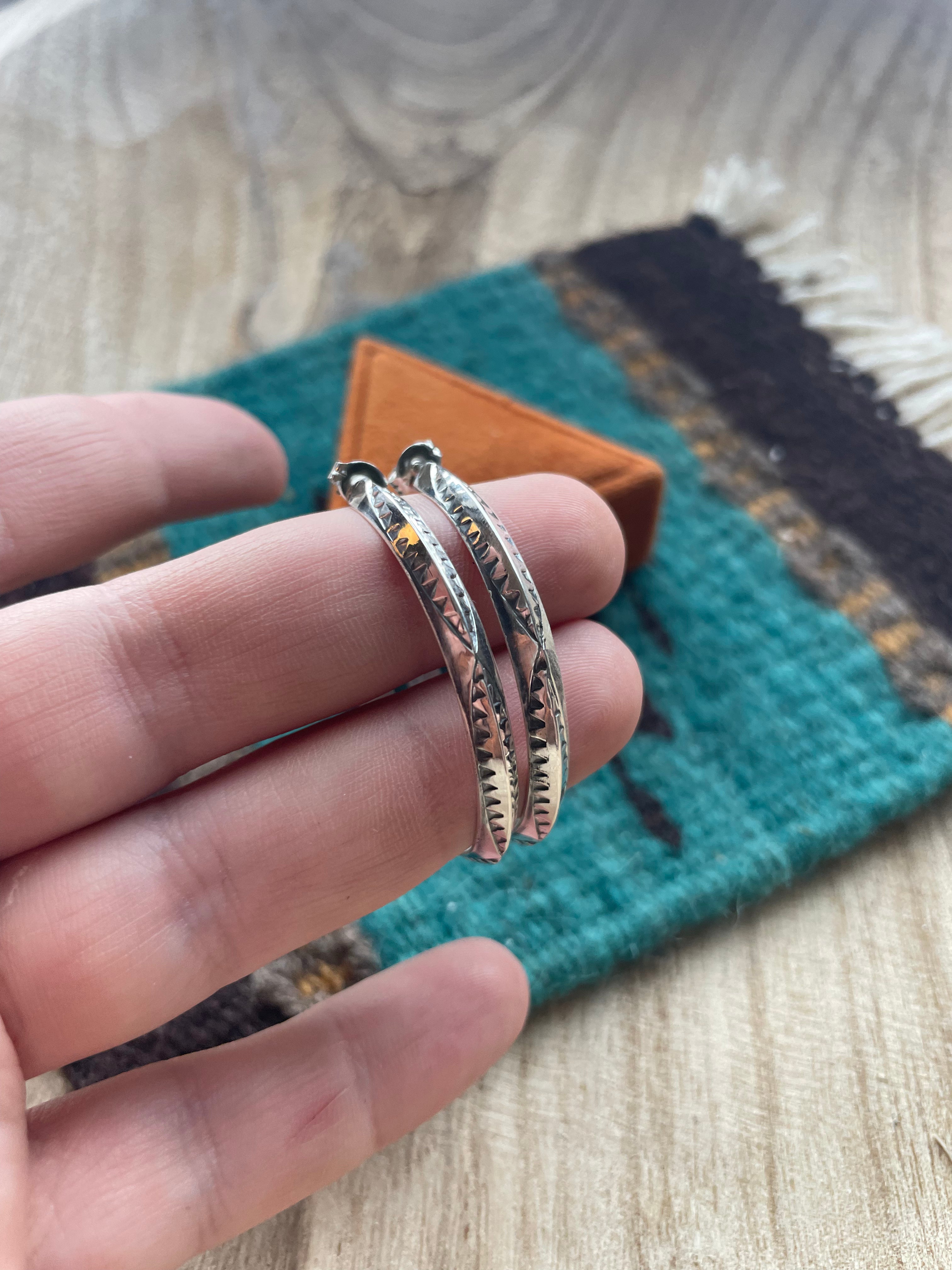 Leander Tahe Hand-stamped Sterling Silver Hoop Dangle Earrings