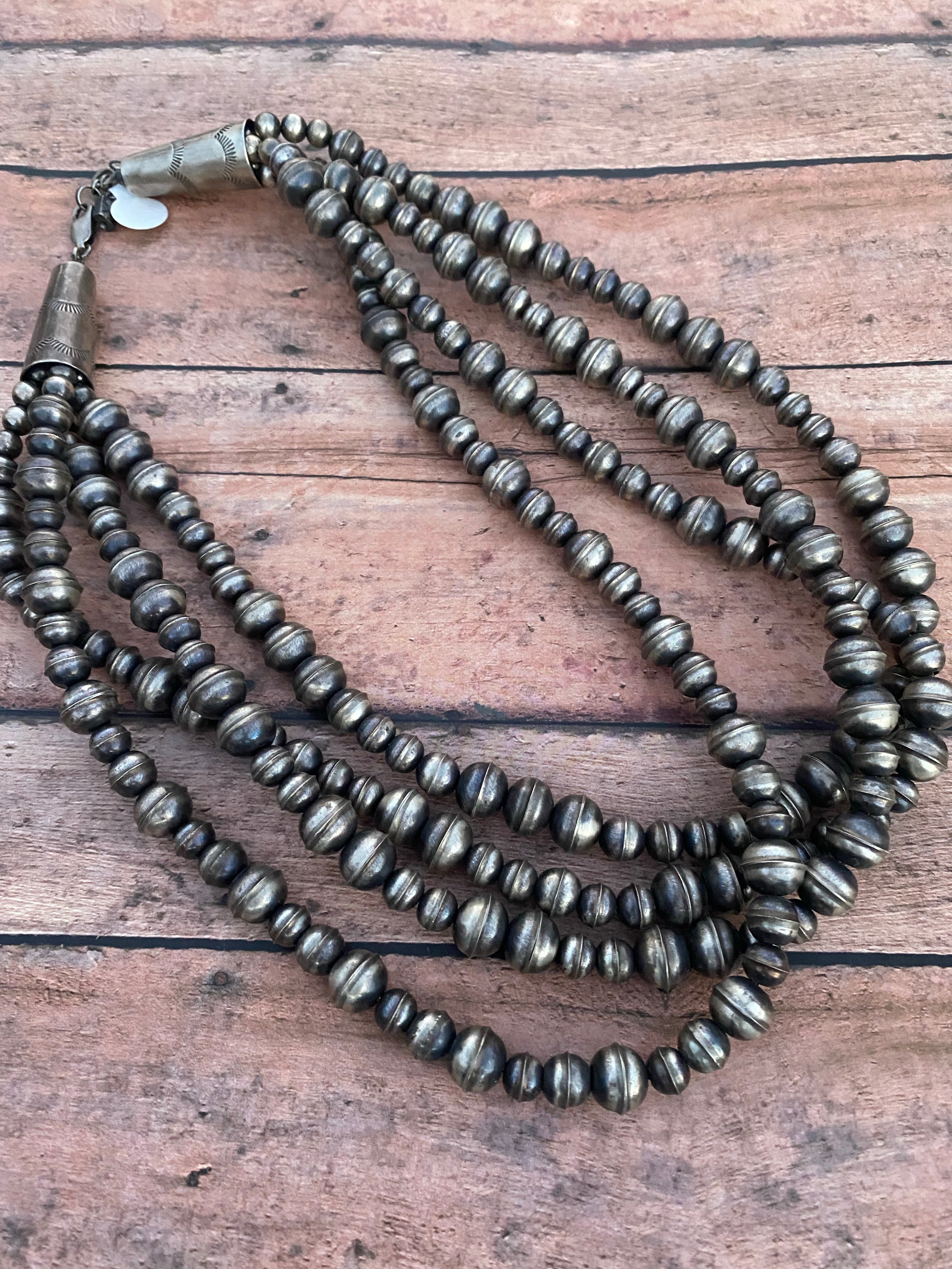 Vintage Navajo Handmade Sterling 4 strand 20 inch beads