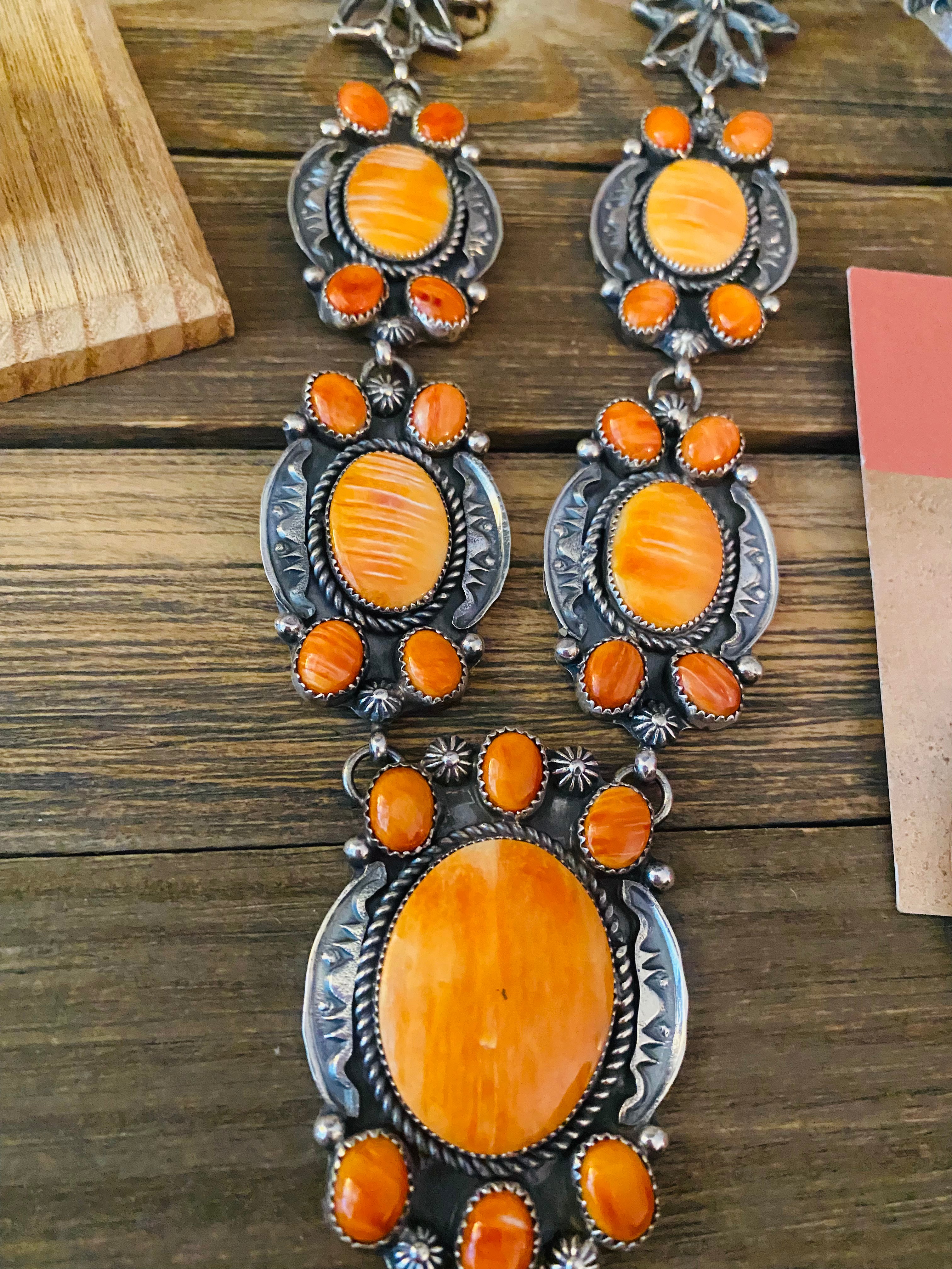 Navajo Orange Spiny And Sterling Silver 4 Piece Set by Kevin Billah