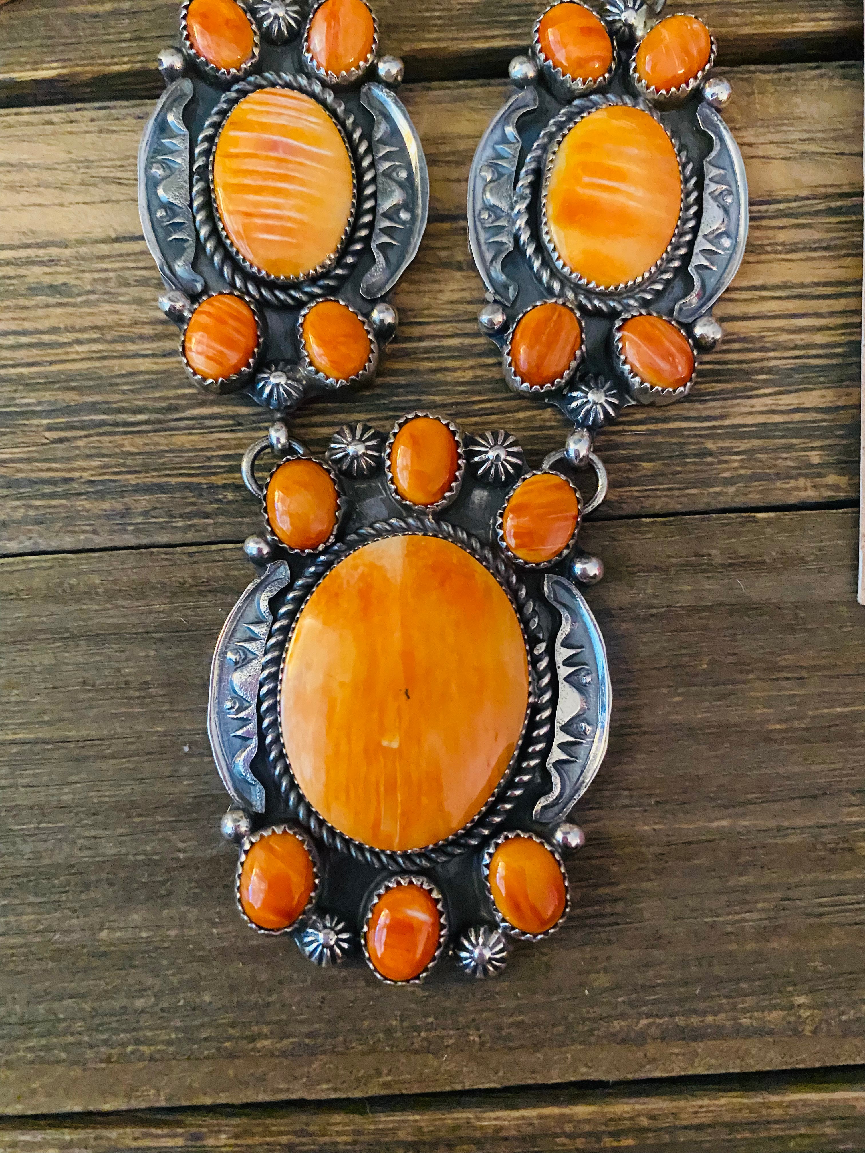 Navajo Orange Spiny And Sterling Silver 4 Piece Set by Kevin Billah